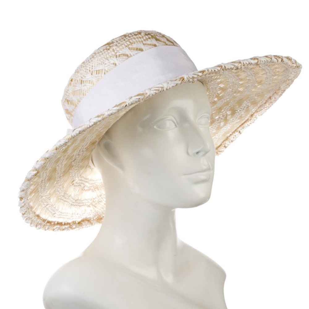 SUZANNE COUTURE
MILLINERY, Made In NYC, Straw Hat with white Grossgrain Bow.